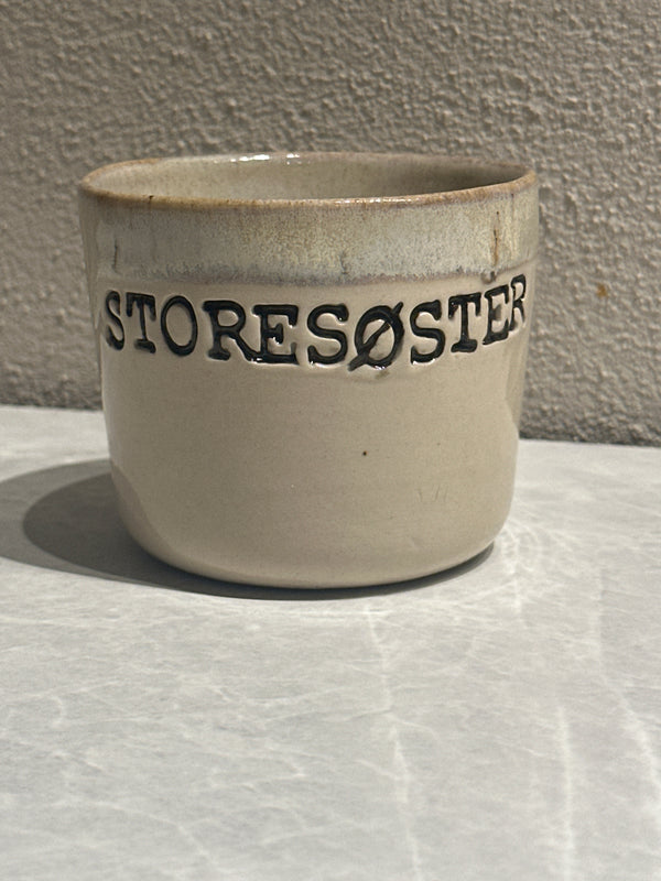 Kop ~ storesøster